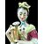 Polychrome porcelain veilleuse-teapoy depicting a lady with watering can. France