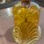 Antique large glass bell, 19th century, yellow and white. Dimensions: H 35 cm, diameter 15 cm.