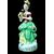 Polychrome porcelain veilleuse-teapoy depicting a lady with watering can. France