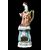 Figurative porcelain veilleuse with lady and floral decoration. France