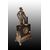 French marble table clock from the 1800s with bronze sculpture and friezes
