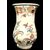 Trumpet-shaped majolica vase with floral motifs. Ferniani, Faenza.