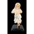 Polychrome wooden sculpture depicting the baby Jesus.