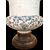 Large majolica albarello mustard pot decorated with two soldiers and stylized rocaille and floral motifs. Marinoni manufacture, Angarano.