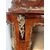 Showcase veneered in various woods. France, late 19th century.