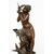 Scultura antica in bronzo patinato firmata "Math Moreau" poggiante su base girevole.Francia XIX secolo.