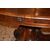 Fixed oval Louis Philippe style living room table from the 1800s in mahogany and elm burl.