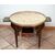 Antique low coffee table, Napoleon III style, in mahogany with inlays of gilded bronze elements. France, 20th century.