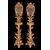 Six palace wall lights in carved and gilded wood and glass