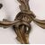 Group of five two-light bronze sconces. 19th century