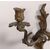 Group of five two-light bronze sconces. 19th century
