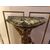 Half-moon console table with 17th-century Putto