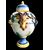 Pair of majolica vases with raised grape vine decoration and leaf motif. Rubbiani manufacture, Sassuolo.