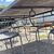 Large handmade wrought iron outdoor table with six chairs. Dimensions: 182 x 112 cm