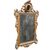 Carved and gilded wooden mirror. Venice, 18th century.