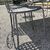 Large handmade wrought iron outdoor table with six chairs. Dimensions: 182 x 112 cm