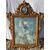 Carved and gilded wooden mirror. Venice, 18th century.