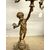 Coppia di candelabri/candelieri bronzo '900 a cinque fiamme con putti, 52x42cm