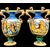 Coppia di vasi in maiolica con manici a decoro istoriato stile Urbino.Marca S.C.A Pesaro