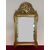 Carved and gilded wooden mirror, Tuscan Empire period, first half of the 19th century