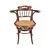 Poltroncina da ufficio in legno intagliato. Probabile manifattura Thonet - Vienna, inizi XX secolo.