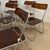 Set of 6 foldable design chairs from the 70s. Metal and smoked plexiglass. Vintage.