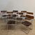 Set of 6 foldable design chairs from the 70s. Metal and smoked plexiglass. Vintage.