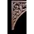 Carved wooden overdoor frieze with a scroll leaf motif.