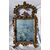 Carved and gilded wooden mirror. Italy, 18th century.