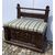 Carved and sculpted wooden bench. Italy, 17th century.