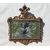 Carved and gilded wooden mirror. Italy, 18th century.