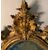Carved and gilded wooden mirror. Northern Italy, 18th century.
