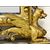 Carved and gilded wooden mirror. Tuscany, early 19th century.