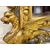 Carved and gilded wooden mirror. Tuscany, early 19th century.