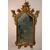Carved and gilded wooden mirror. Northern Italy, 18th century.