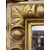 Carved and gilded wooden mirror. Tuscany, early 19th century.