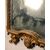 Carved and gilded wooden mirror. Northern Italy, 18th century.