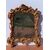 Carved and gilded wooden mirror. Venice, 18th century.