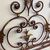 Elegant antique wrought iron double bed headboard. Gold and purple, circa 1930. Dimensions: cm180 . h 155