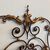 Elegant antique wrought iron double bed headboard. Gold and purple, circa 1930. Dimensions: cm180 . h 155