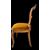 Four walnut chairs carved with rocaille motifs.