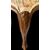 Four walnut chairs with floral pattern carvings.