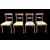 Four walnut chairs with geometric pattern decoration.