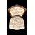 Four walnut chairs with floral pattern carvings.