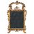 Carved and gilded wooden mirror. Italy, 18th century.