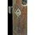 Pair of walnut doors with four engraved diamond panels.