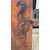 Pair of walnut doors with four engraved diamond panels.