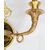 Coppia di Applique antichi Impero in bronzo dorato e satinato sapientemente cesellato. Francia XIX secolo.