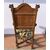 Carved, veneered and inlaid wooden armchair. Italy, 17th-18th century.
