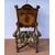 Carved, veneered and inlaid wooden armchair. Italy, 17th-18th century.